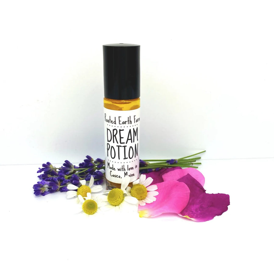 sleep oil infused with chamomile, roses, and lavender, relaxing roll on for dreams and sleep