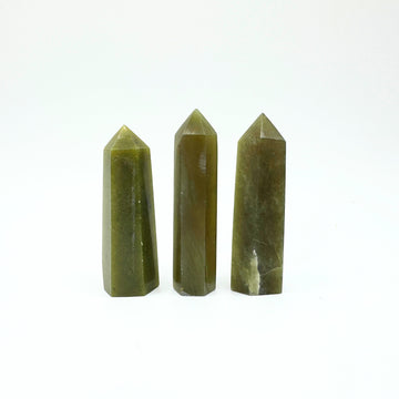 olive green jade crystal point gemstone