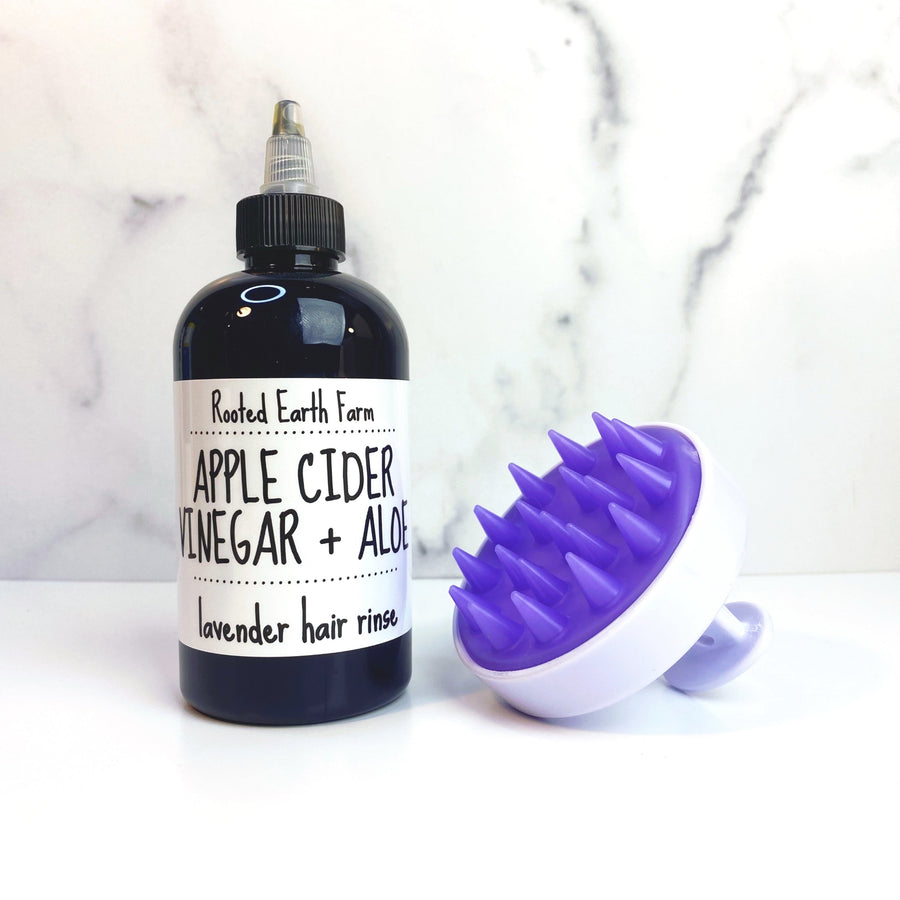 Hair care gift set with ACV and aloe hair rinse and a scalp massager