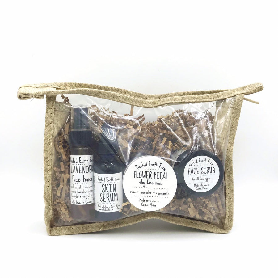 plant based skin care gift set, lavender face toner, herbal face scrub, skin serum, and flower petal clay face mask