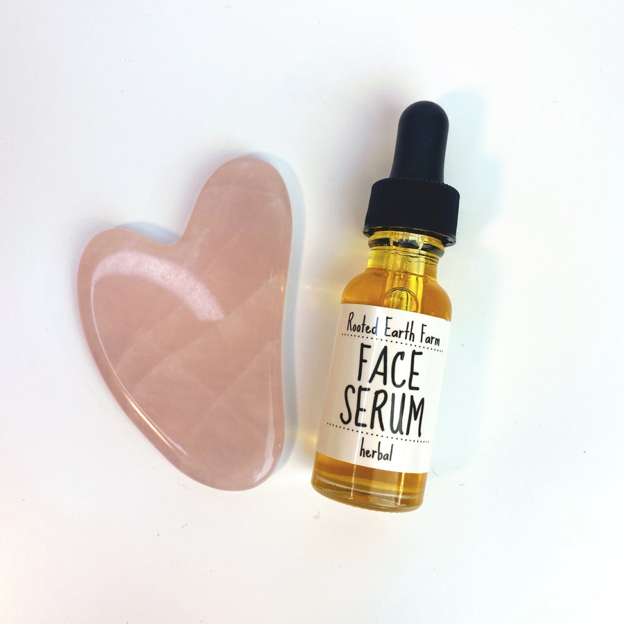 face serum and gua sha, facial massage
